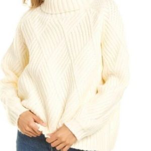 Soft & cozy cable knit sweater in Ivory. Polyester 75%, Cotton 25% no pilling